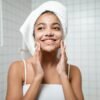 woman washing her face